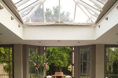Roof lantern as part of an orangery extension featuring pinoleum blinds