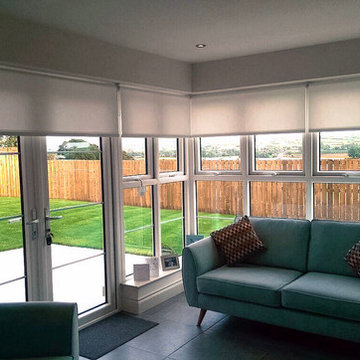 Scandinavian Inspired Sunroom Interior with Minimal Roller Blinds