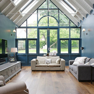 Design ideas for a large classic conservatory in Other with medium hardwood flooring, no fireplace, a standard ceiling and brown floors.