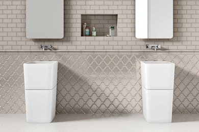 Modelo de cuarto de baño tradicional renovado con baldosas y/o azulejos grises y baldosas y/o azulejos de cerámica