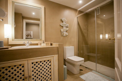 Imagen de cuarto de baño tradicional renovado con microcemento