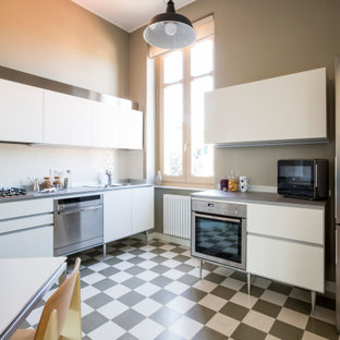Ispirazione per una piccola cucina a L minimal chiusa con lavello a doppia vasca, ante lisce, ante bianche, top in laminato, paraspruzzi bianco, paraspruzzi con piastrelle in ceramica, elettrodomestici in acciaio inossidabile, pavimento in cementine, pavimento multicolore, top grigio e nessuna isola