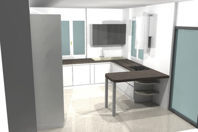 Esempio di una grande cucina ad U design con lavello da incasso, top in laminato e paraspruzzi a effetto metallico