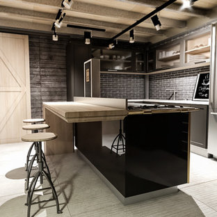This is an example of a mid-sized industrial l-shaped open plan kitchen in Milan with a drop-in sink, recessed-panel cabinets, grey cabinets, recycled glass benchtops, stainless steel appliances, porcelain floors, with island and white floor.