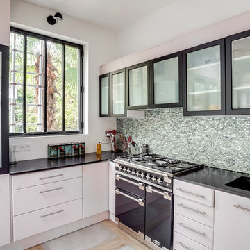 Création d’une grande ouverture sur le jardin et Rénovation d’une cuisine