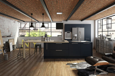 Inspiration for a large urban galley kitchen/diner in Lyon with a single-bowl sink, grey splashback, stainless steel appliances and an island.