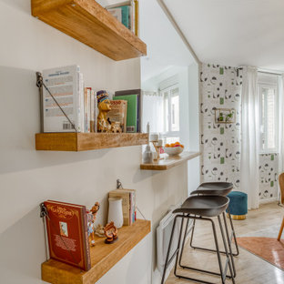 Design ideas for a mid-sized traditional u-shaped open plan kitchen in Paris with an undermount sink, beaded inset cabinets, white cabinets, wood benchtops, white splashback, ceramic splashback, stainless steel appliances, cement tiles, a peninsula, grey floor and beige benchtop.