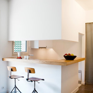 Aménagement d'une cuisine américaine contemporaine en L de taille moyenne.