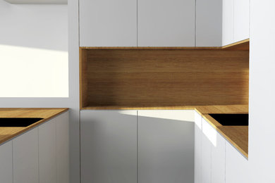 Diseño de cocina actual con puertas de armario blancas, encimera de madera, salpicadero de madera, electrodomésticos con paneles y una isla