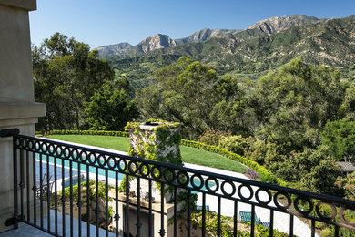 This is an example of a mediterranean terrace in Santa Barbara with a roof extension.