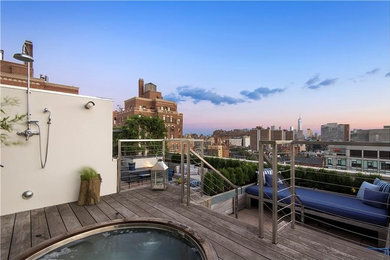 Inspiration for an expansive contemporary roof terrace in New York with a water feature and no cover.