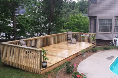 Inspiration for a timeless backyard deck remodel in Other