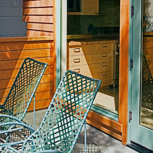 Example of a small trendy backyard deck design in San Francisco with no cover