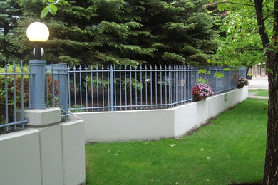 Deck - mid-sized contemporary backyard deck idea in Calgary