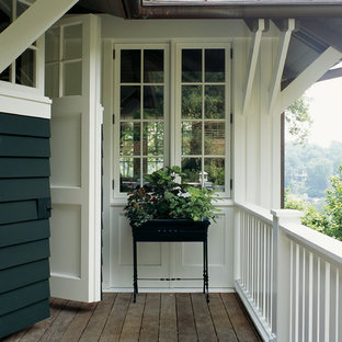 Example of an arts and crafts deck design in Baltimore
