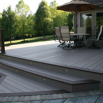 Azek deck with lighting, flower boxes, and benches