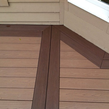 AZEK Deck with Timbertech Builderrail and Genovations Brownstone post wraps