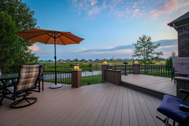 Inspiration for a large timeless backyard deck remodel in Indianapolis with no cover