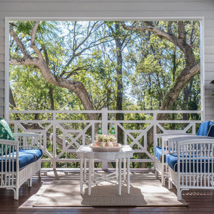 This is an example of a beach style deck in Brisbane.