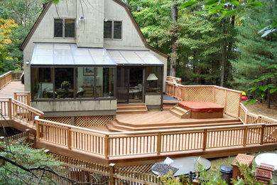 Example of a huge backyard water fountain deck design in New York