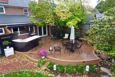 Water fountain deck - mid-sized contemporary backyard water fountain deck idea in Other