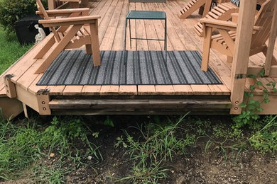 Example of an arts and crafts deck design in Indianapolis