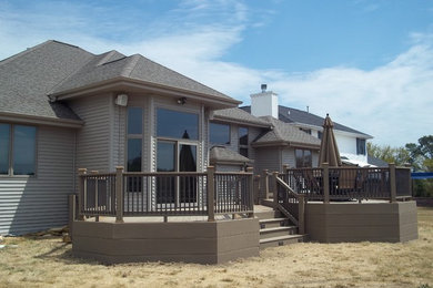 Example of an arts and crafts deck design in Milwaukee