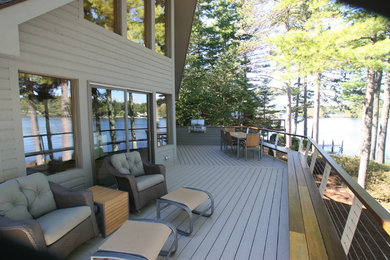 Inspiration for a mid-sized contemporary deck remodel in Portland Maine