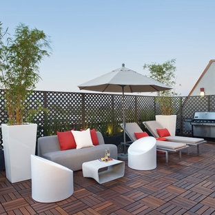Idee per una grande terrazza bohémian sul tetto con nessuna copertura