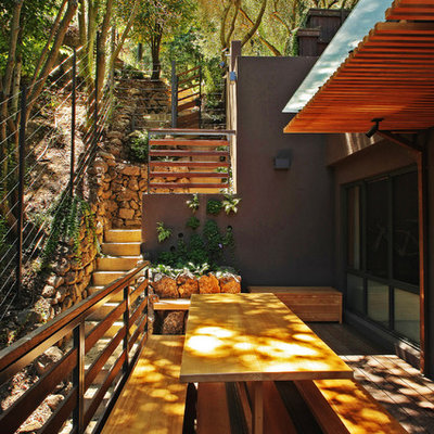 Inspiration for a small contemporary side yard deck remodel in San Francisco with an awning