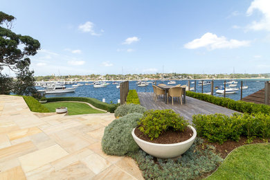 Medium sized nautical back terrace in Sydney with no cover.