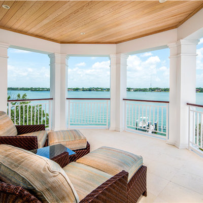 Dock - mid-sized coastal side yard dock idea in Tampa with a roof extension