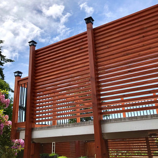 Idée de décoration pour une terrasse arrière craftsman avec des solutions pour vis-à-vis.