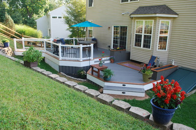 Example of an arts and crafts deck design in Philadelphia