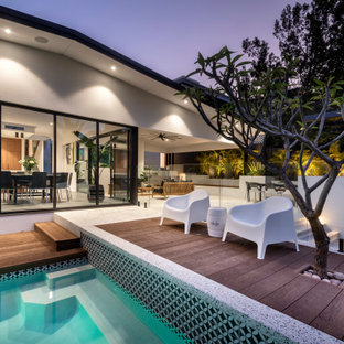 Design ideas for a midcentury deck in Perth with no cover.