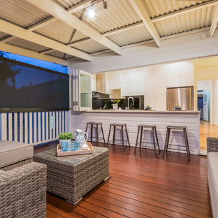 Beach style deck in Brisbane with an awning.