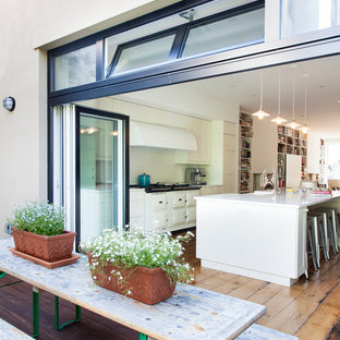 Deck container garden - mid-sized contemporary backyard deck container garden idea in New York with no cover