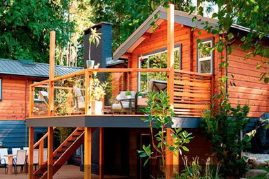 Inspiration for a mid-sized rustic backyard deck remodel in Vancouver with no cover