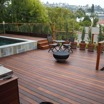 Contemporary  backyard pool deck