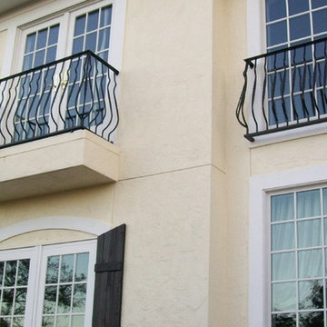 Contemporary Balcony Railings and Iron Sconces