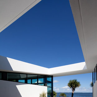 Idee per una grande terrazza minimal sul tetto con nessuna copertura