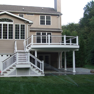 Curved Composite Deck and Rails w/ Finished Area Below and Fire Pit