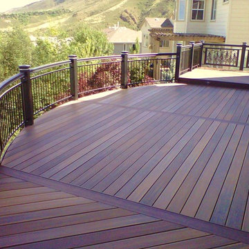 Curved Deck with Custom Iron Railings and LED Lighting