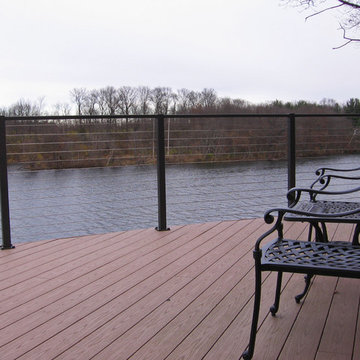 Curving Bronze Aluminum Posts and Handrail for Riverside Deck