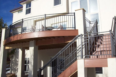 Custom Curved Deck with Iron Railings and