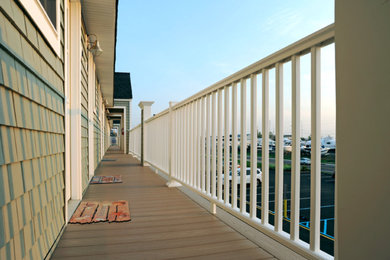 Example of a beach style deck design in New York