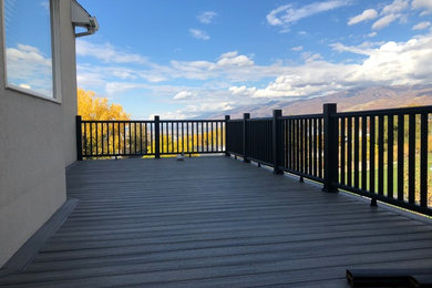 Mid-sized elegant backyard deck photo in Salt Lake City