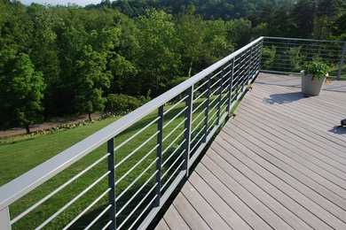 Large elegant rooftop deck photo in Other