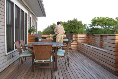 This is an example of a medium sized contemporary roof terrace in Boston.