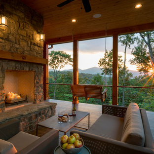 Arts and crafts deck photo in Other with a fire pit and a roof extension